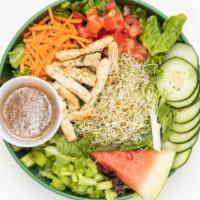 Pesto Chick’n Salad · Mixed greens, tomatoes, sprouts, cucumbers, carrots, vegan chick’n strips, and Italian dress...