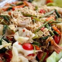 Tum Mee Wai Wai/Instant Ramen Salad · Mama instant ramen, pork patty, blanched veggies, tomatoes, shrimp paste, home made padek/ f...