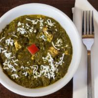 Palak Paneer (Spinach & Cheese)   · Homemade cottage cheese cubes in a mildly spiced semi pureed Spinach with ginger, garlic, on...
