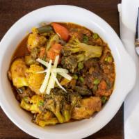 Namastey Mixed Vegetable Curry   · Seasonal vegetables cooked in tomato based curry sauce.
Gluten Free, Vegan