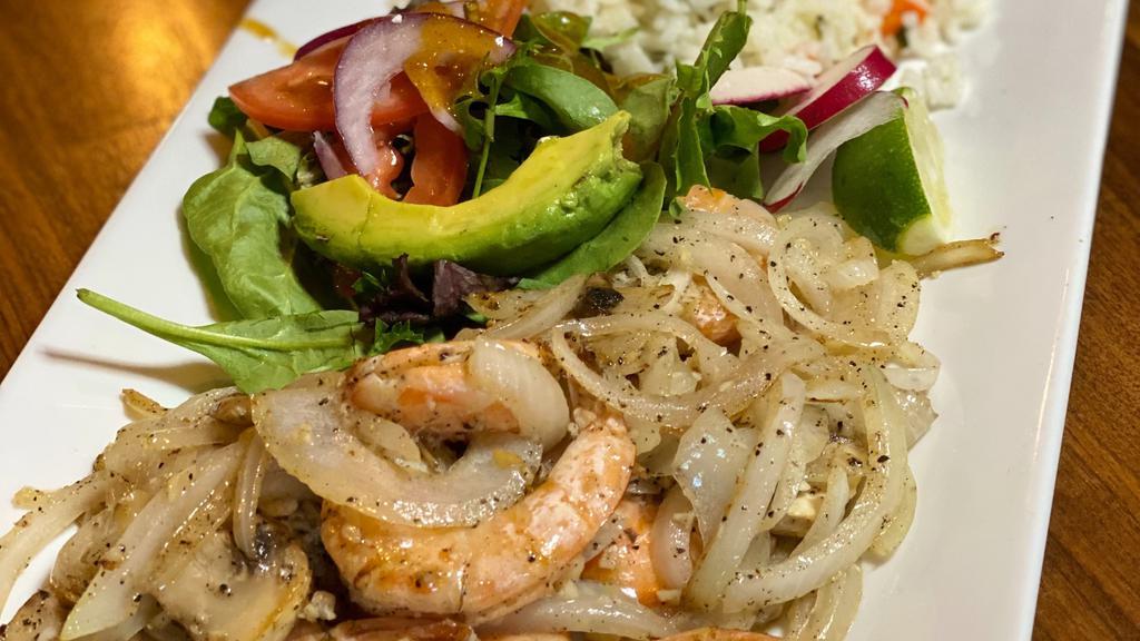 Camarones al Ajo · Sautéed white wine Garlic shrimp, with roasted garlic flakes, onions, mushrooms. Served with white rice and salad.