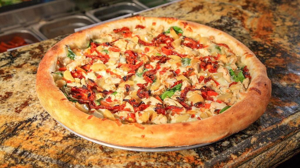 The Martinelli · Favorite. Roasted garlic sauce, red bell peppers, fresh spinach, chicken, roasted garlic cloves, sun- dried tomatoes, and freshly grated Parmesan cheese.
