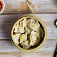 Steamed Dumplings · Fresh vegetables wrapped in dumpling skin and steamed to perfection.