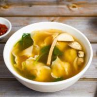 Wonton Soup · Ground veggie wonton, cooked in a vegetable broth and vegetables and mushroom.