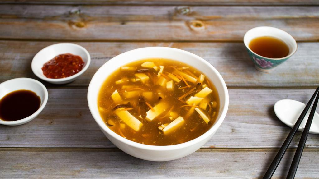 Hot & Sour Soup · Tofu, vegan chicken, mushroom, soy sauce, in a spicy and sour blend.