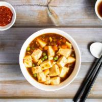 Spicy Mapo Tofu · Tofu simmered and cooked in a spicy chili sauce.