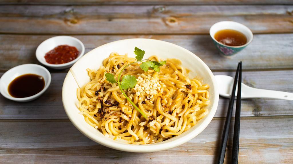 Spicy Tan Tan Noodles · Spicy noodles cooked in a creamy broth with peanut and chili oil.