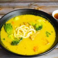 Curry Tofu Udon Soup with Vegetables · Assortment of tofu, vegetables and noodles cooked in a curry udon broth.