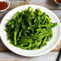 Stir Fried Pea Sprouts · Gluten free. Stir fried fresh pea sprouts with ginger.