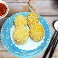 Sweet Sesame Balls (4pcs) · Deep fried glutinous rice ball with red bean fillings. Coated with sesame seed.