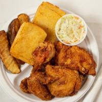 Chicken Dinner · 4 pieces Crisp & Juicy Fried Chicken Served with Wedge Cut Potatoes, Cup Coleslaw and 2 slic...