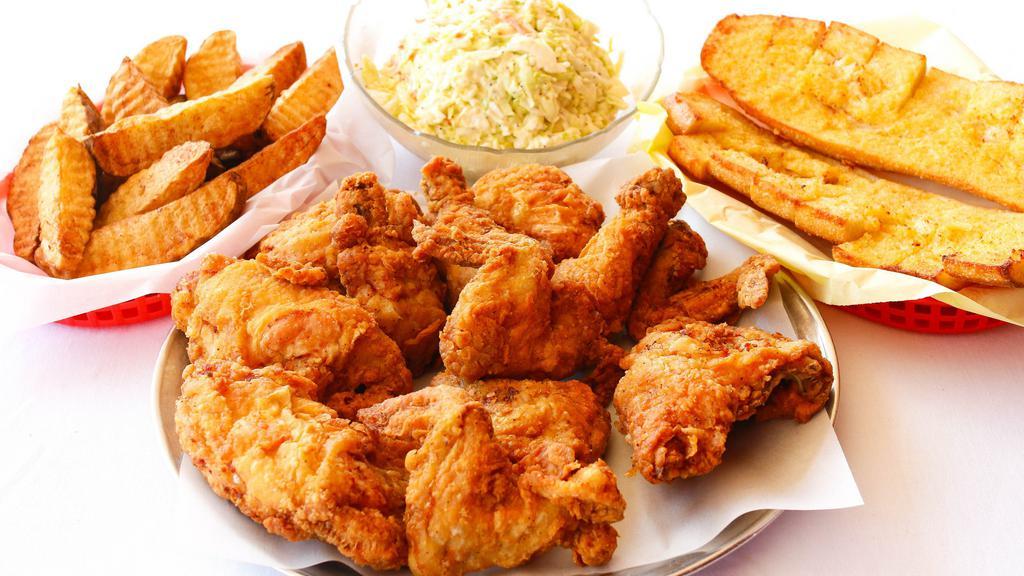 #2 (12pc) Chicken Dinner · Includes Pint Coleslaw, Garlic Bread & Wedge Cut Potatoes. 3-Breasts, 3-Thighs, 3-Legs & 3-Wings