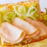 Turkey Sandwich · Served on a 8” Bordenave’s soft french roll, Includes mayonnaise, onions, lettuce, and ameri...