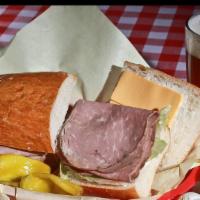 Ham Sandwich · Served on a 8” Bordenave’s soft french roll, Includes mayonnaise, onions, lettuce, and ameri...