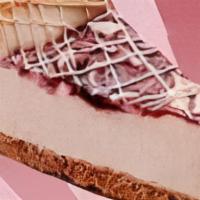 White Choc. Raspberry Cheesecake(slice) · Cream cheese and white chocolate flavored cheesecake, swirled with raspberry puree and finis...