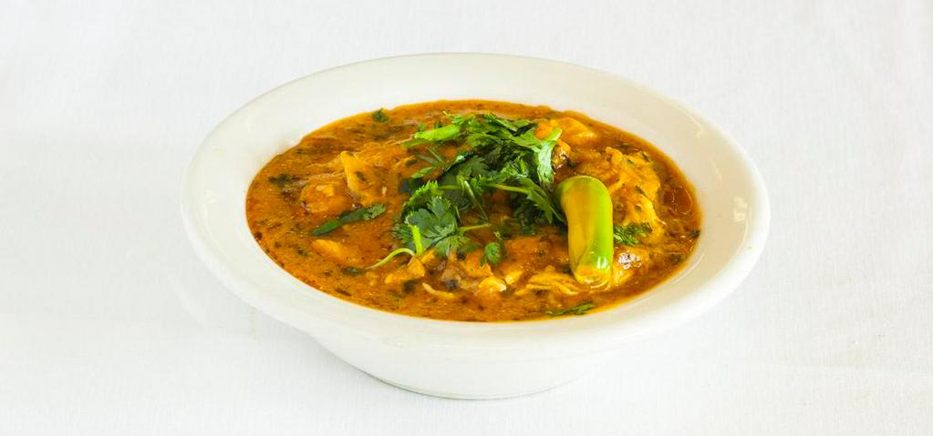 Chicken Karahi · Chicken cooked with bell peppers and onions.