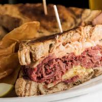 N. Y. Reuben Sandwich · corned beef, sauerkraut, swiss cheese, 1000 island on marble rye bread