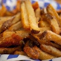 House Cut Seasoned French Fries · Gluten-free, vegan. Basket of house-cut seasoned French fries served with house dipping sauce.