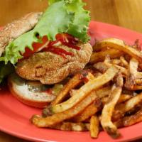 Southern Fried Tofu Burger · Battered crispy tofu with vegan mayo, ketchup, lettuce, tomato, pickles, and onions. Served ...