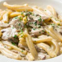 Casarecce · Short twist pasta with mushrooms, pesto & cream sauce (vegetarian)