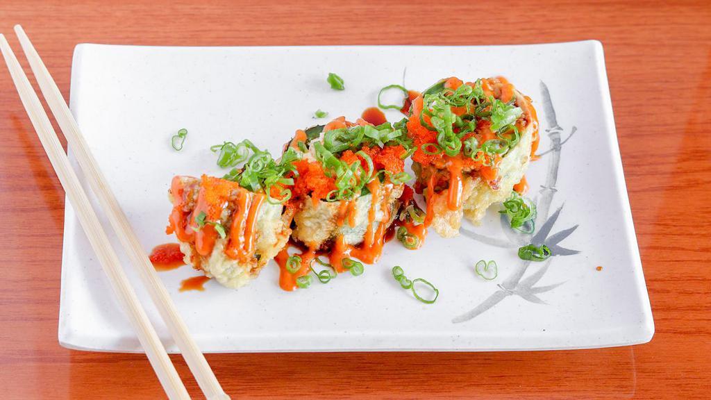 Jalapeno Bomb · Two pieces spicy salmon, cream cheese and crab, deep fried, topped with special sauce.