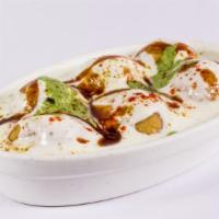 Yogurt with Dahi-Bhalla · A delectable combination of spicy green chutney and sweet tamarind chutney.