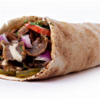 Lamb and Beef Shawarma Sandwich · Delicious juicy lamb and beef wrapped with hummus, tahini, tzatziki, red onion, hot sauce, l...