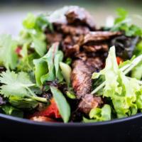 Beef Gyro Salad · Delicious beef gyro with seasoned mixed greens, cucumbers, tomatoes, olives, lemon juice and...