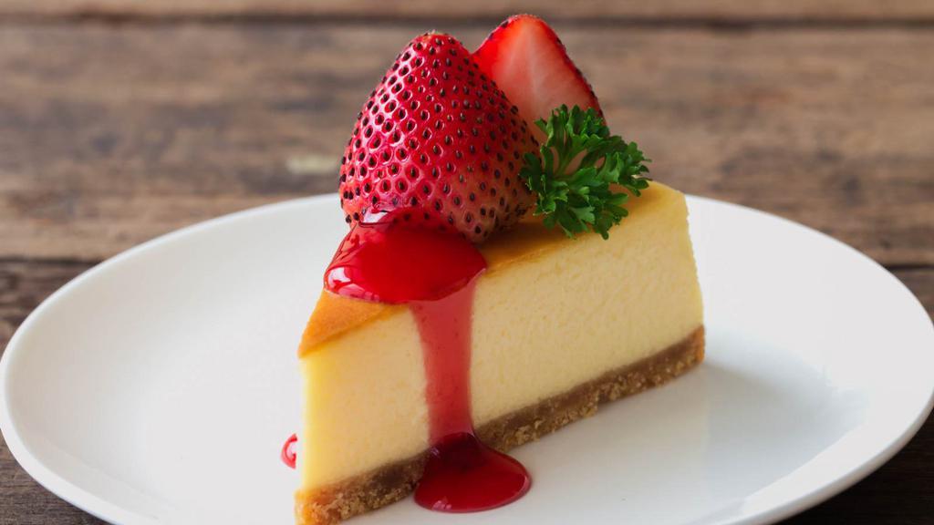Strawberry New York Cheesecake · Delicious classic cheesecake with strawberries.