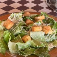 Caesar Salad · Add Marinated Broiled Chicken Breast for an additional charge.