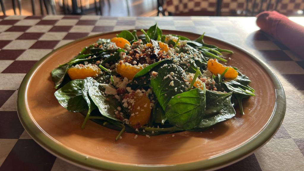 Spinach Salad · Honey mustard dressing with mushrooms, onions, bacon, mandarin oranges, and Feta cheese. Add marinated broiled chicken breast for an additional charge.