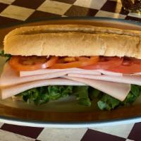 Turkey Breast · Toasted or Cold. Served on French Roll With Tomatoes and Lettuce. Add cheese for an addition...