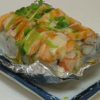 Lion King · California roll, baked salmon, sauces.