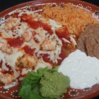 Shrimp Enchiladas · Shrimp sautéed in ranchero sauce, rolled into flour tortillas drenched with melted pepper ja...