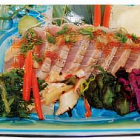 Nijo Tuna Tataki Sashimi · Seared tuna, fresh salad with special sauce.