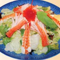 Seafood Salad · Fresh green salad with avocado and baby shrimp.