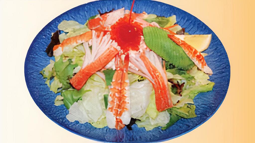 Seafood Salad · Fresh green salad with avocado and baby shrimp.