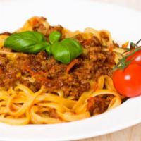 Ground Beef Linguine · Savory ground beef mixed in our homemade linguine with a choice of sauce.