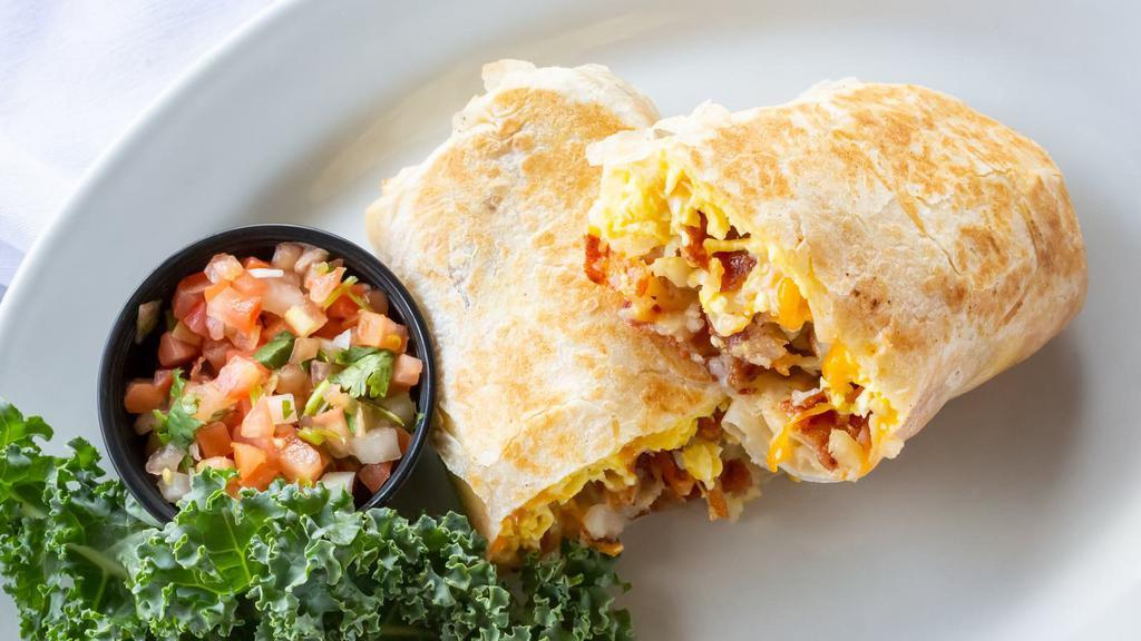 Eggs, Cheese, Potatoes Burrito · Fresh cooked scrambled eggs mixed with melted cheese and mashed potatoes.