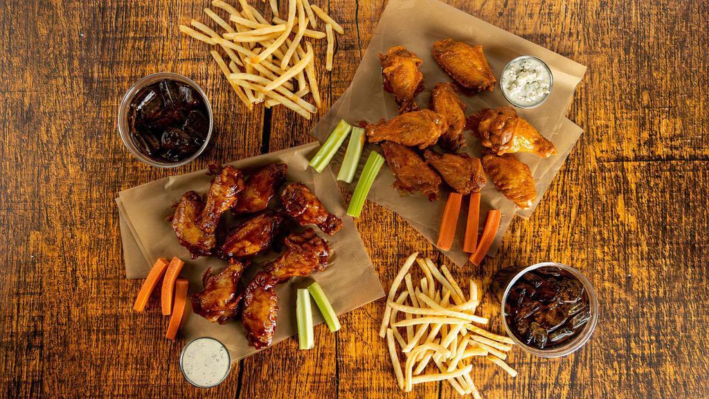 16-Count Party Pack · 16 count order of traditional wings tossed in up to 2 different flavors or naked with up to 2 different flavors on the side. Comes with 2 servings of classic fries, 2 drinks, carrots & celery, and 2 dipping sauces of your choice.