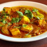Karahi Paneer · Cheese cubes cooked with ginger, garlic, onion & bell peppers and a special blend of spices.