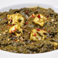 Palak Paneer · Spinach cooked with home made cheese.