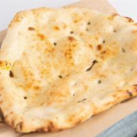 Plain Naan · Fresh oven baked bread layered with butter.