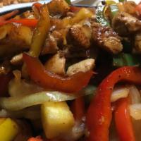 Pineapple Chicken Fajitas · Chicken and pineapple. Served with rice, beans, pico de gallo, sour cream guacamole, and tor...