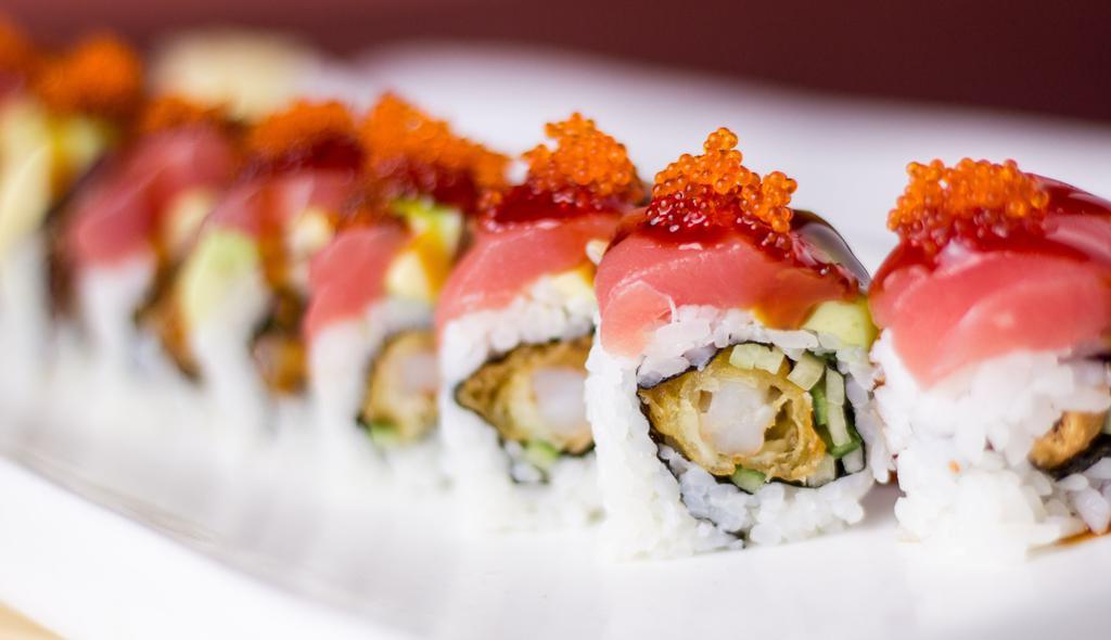 Burlingame · Shrimp tempura & cucumber roll topped with fresh red tuna, avocado, unagi sauce, and tobiko.