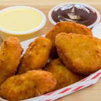 Chicken Nuggets · Ranch, BBQ, or Honey Mustard dipping sauce
