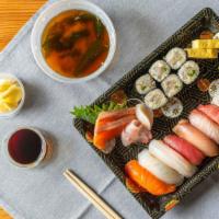 CHEF OMAKASE for 1 person · 6 pc of sashimi(3 different kinds), 10 pieces premium  sushis, chef choose sushi roll, homem...