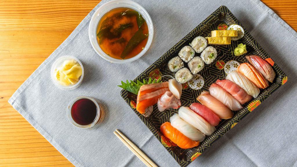 CHEF OMAKASE for 1 person · 6 pc of sashimi(3 different kinds), 10 pieces premium  sushis, chef choose sushi roll, homemake tamago.