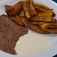 Platanos Fritos · Fried Plantains. Salvadoran sour cream and  beans.