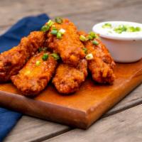 * Buffalo Wings · 6 traditional buffalo sauce [or] bbq. sauce . side of blue cheese dip . celery